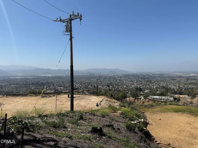 a view of a water with a building in the background