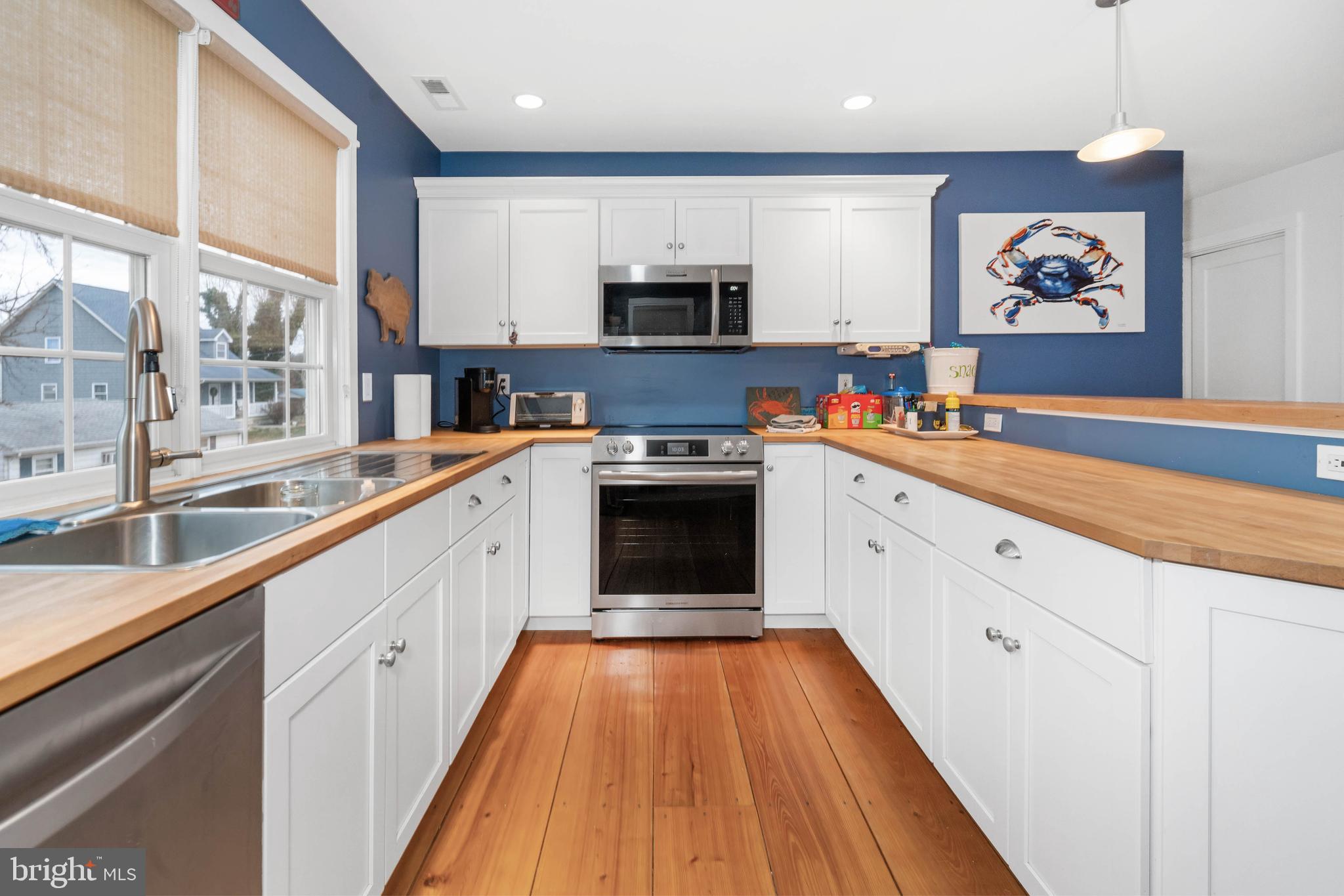 38 Virginia Avenue Earleville, MD 21919 - Photo 28 of 60 a kitchen with granite countertop stainless steel appliances sink and cabinets