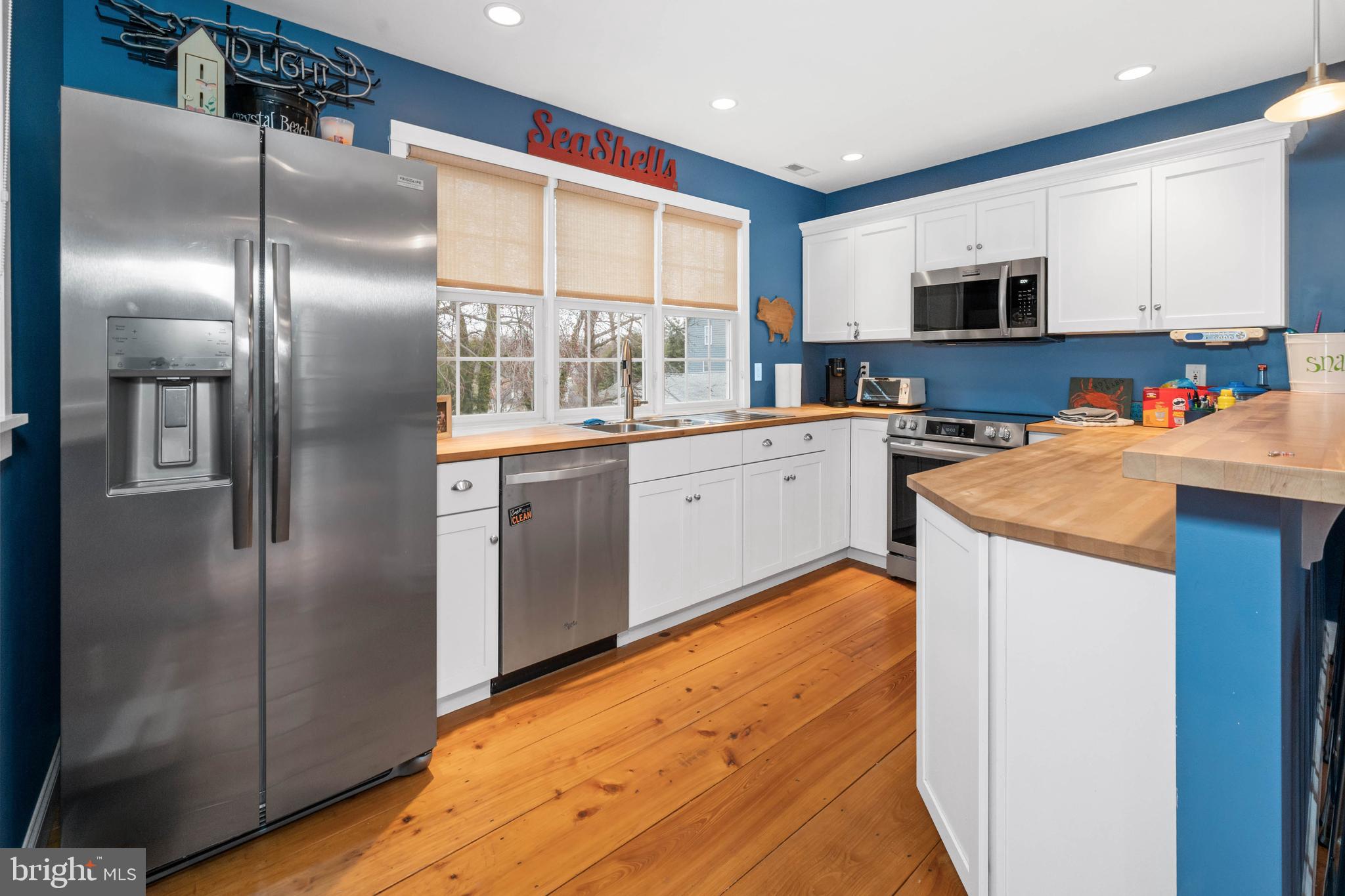 38 Virginia Avenue Earleville, MD 21919 - Photo 30 of 60 a kitchen with stainless steel appliances granite countertop a refrigerator a stove and a sink