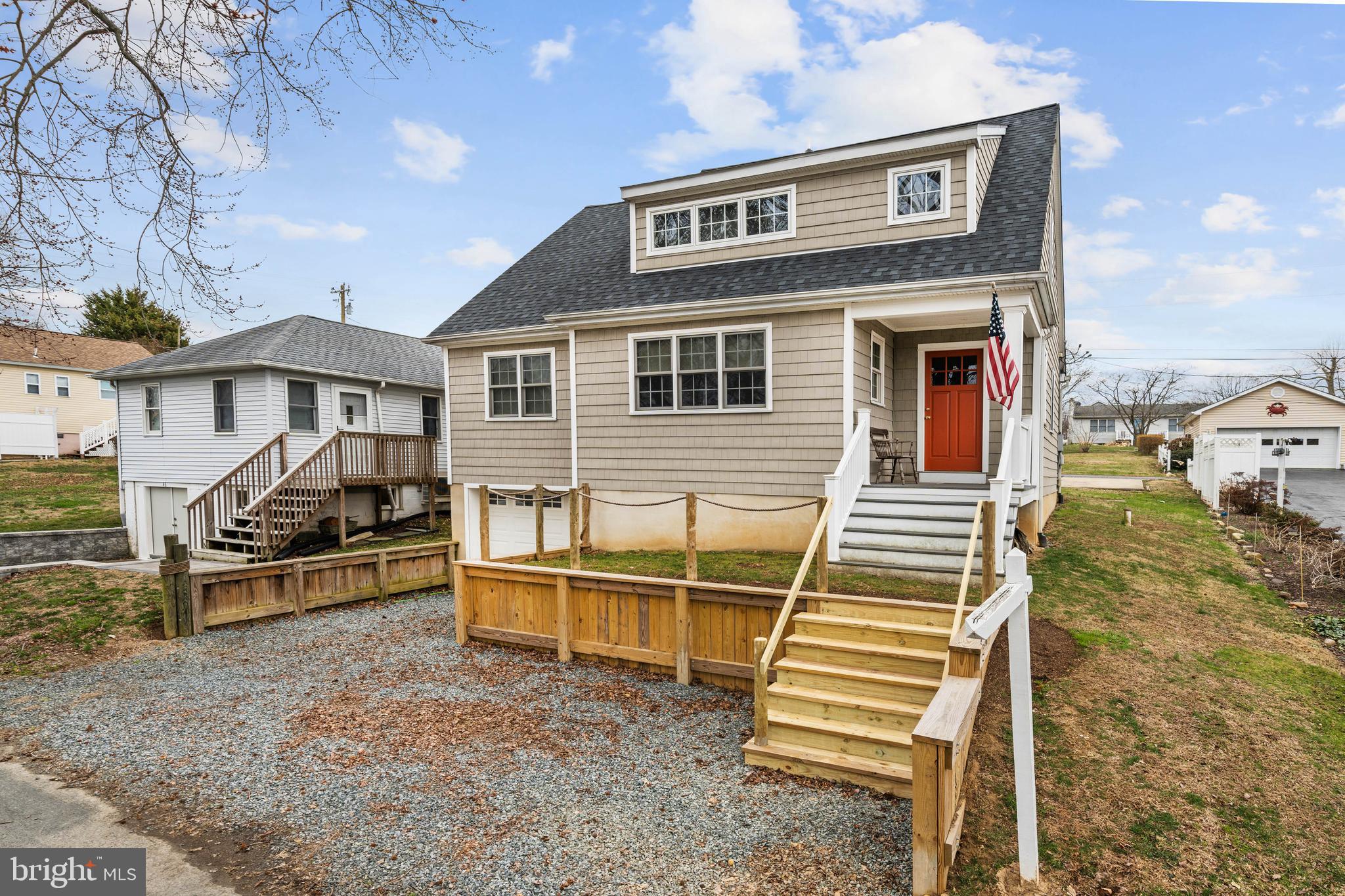 38 Virginia Avenue Earleville, MD 21919 - Photo 3 of 60 a front view of a house with a yard
