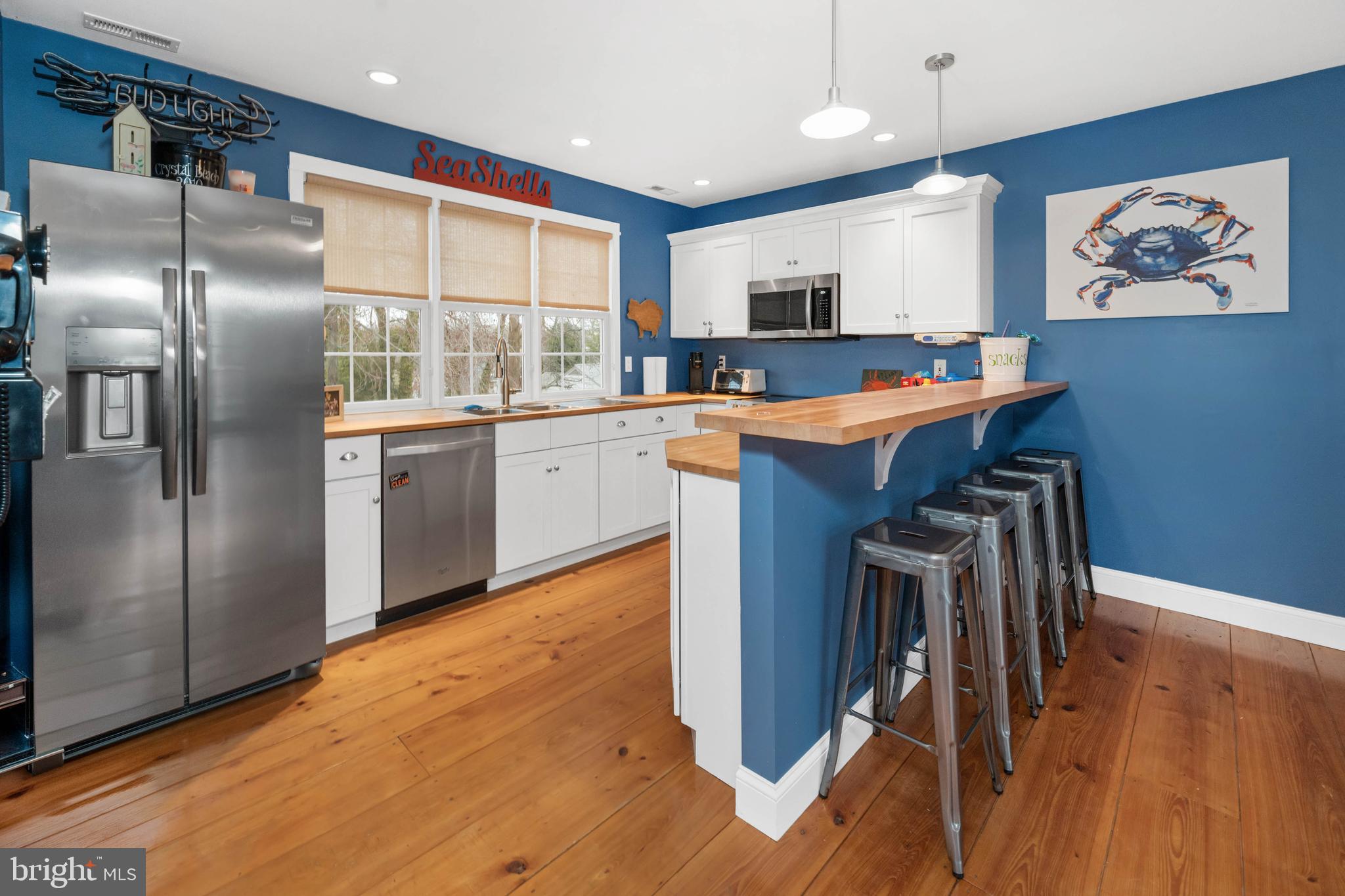 38 Virginia Avenue Earleville, MD 21919 - Photo 31 of 60 a kitchen with stainless steel appliances granite countertop a refrigerator and a stove top oven