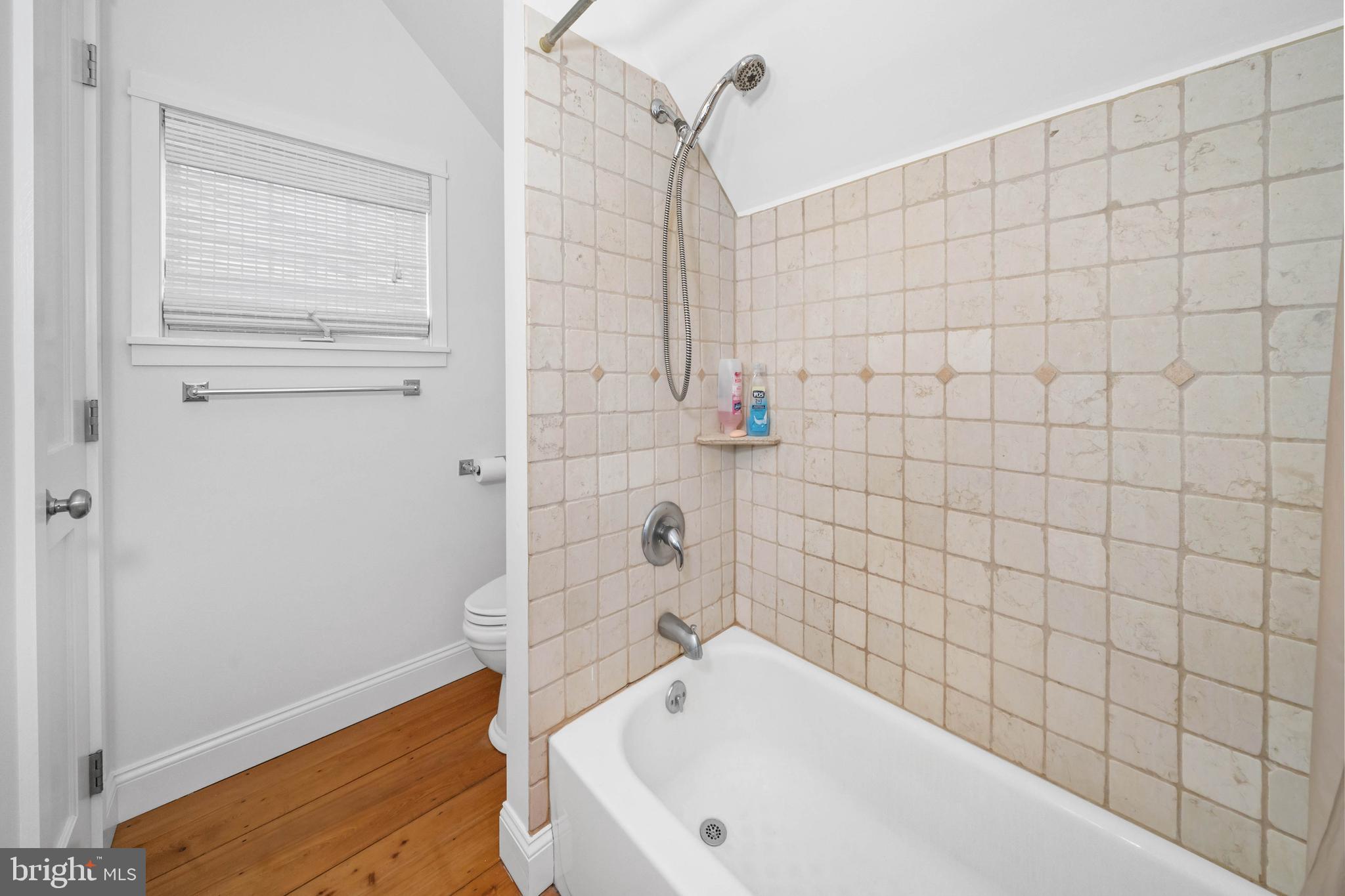 38 Virginia Avenue Earleville, MD 21919 - Photo 42 of 60 a bathroom with a white bathtub