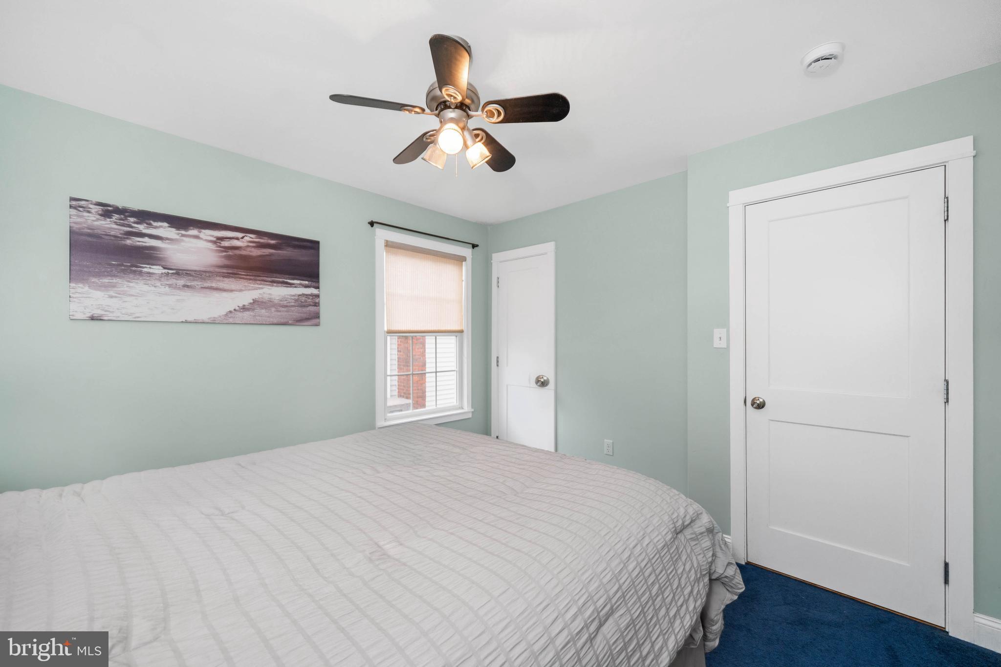 38 Virginia Avenue Earleville, MD 21919 - Photo 44 of 60 a bedroom with a large bed and a window