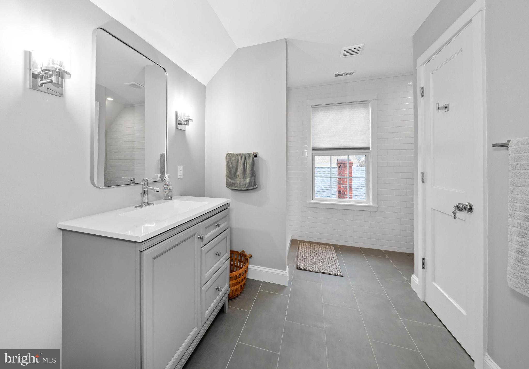 38 Virginia Avenue Earleville, MD 21919 - Photo 47 of 60 a bathroom with a sink and a mirror
