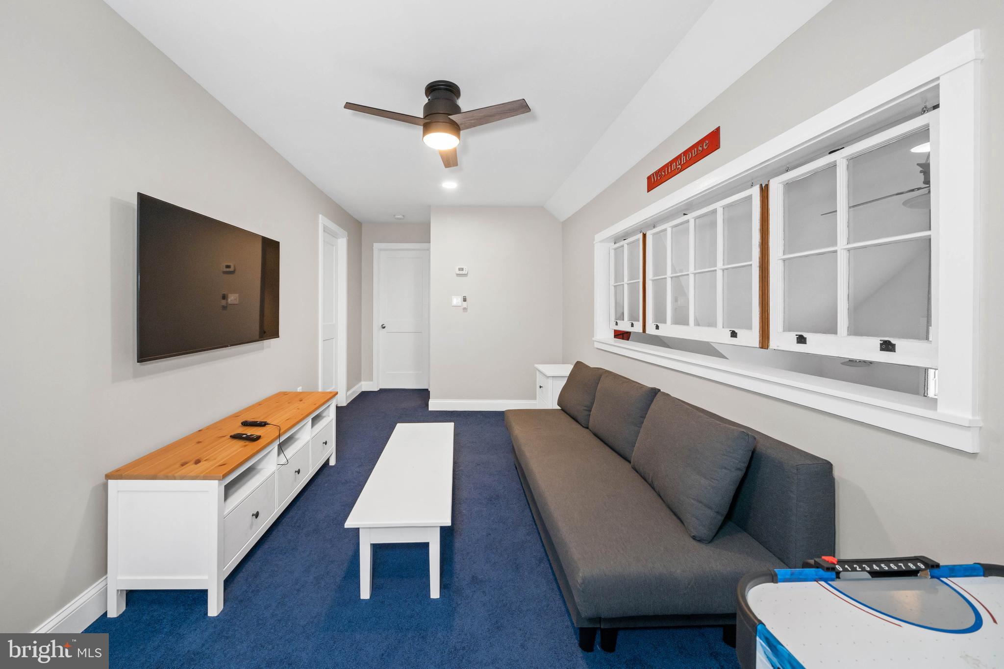 38 Virginia Avenue Earleville, MD 21919 - Photo 53 of 60 a living room with furniture and a flat screen tv