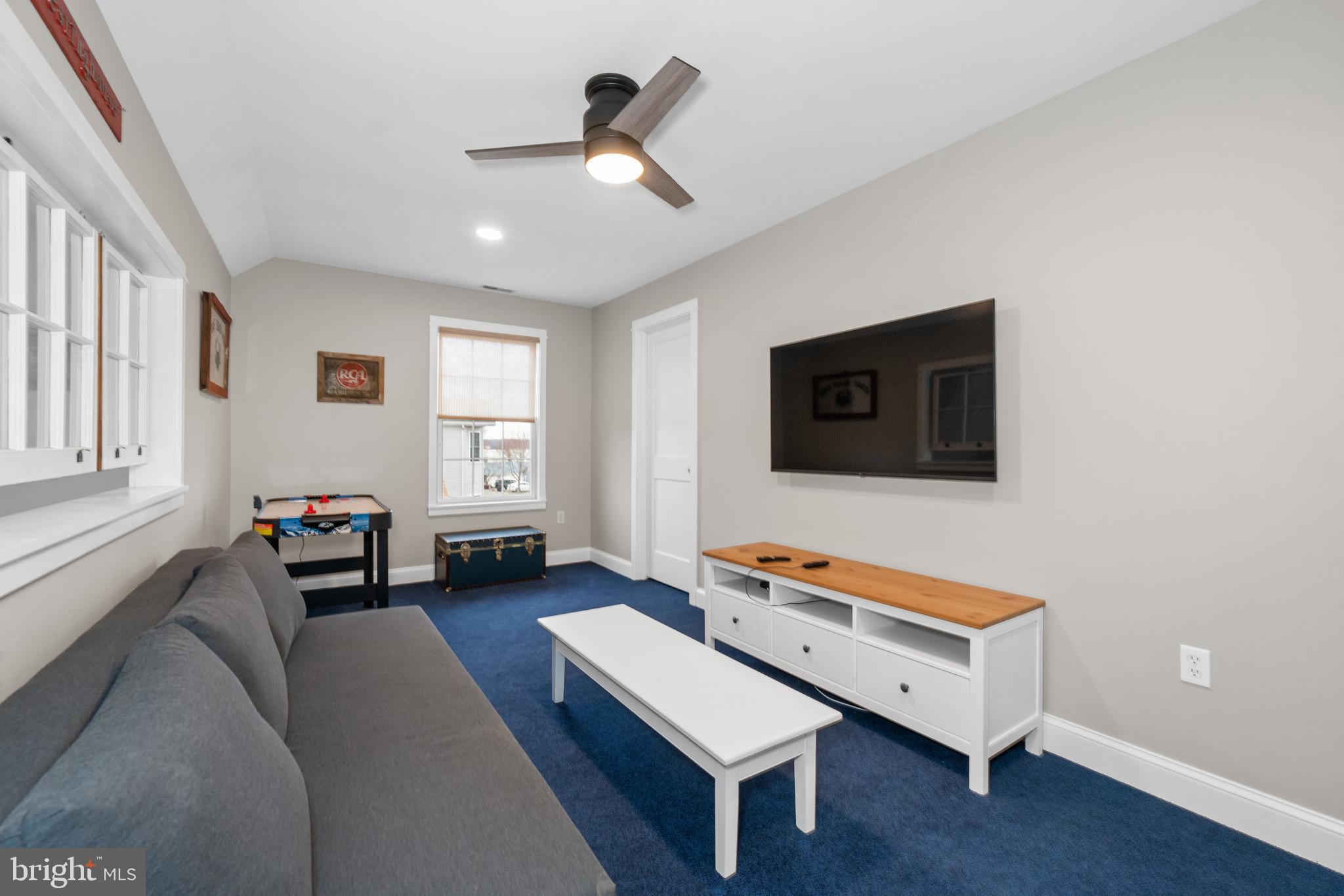 38 Virginia Avenue Earleville, MD 21919 - Photo 54 of 60 a living room with furniture and a flat screen tv