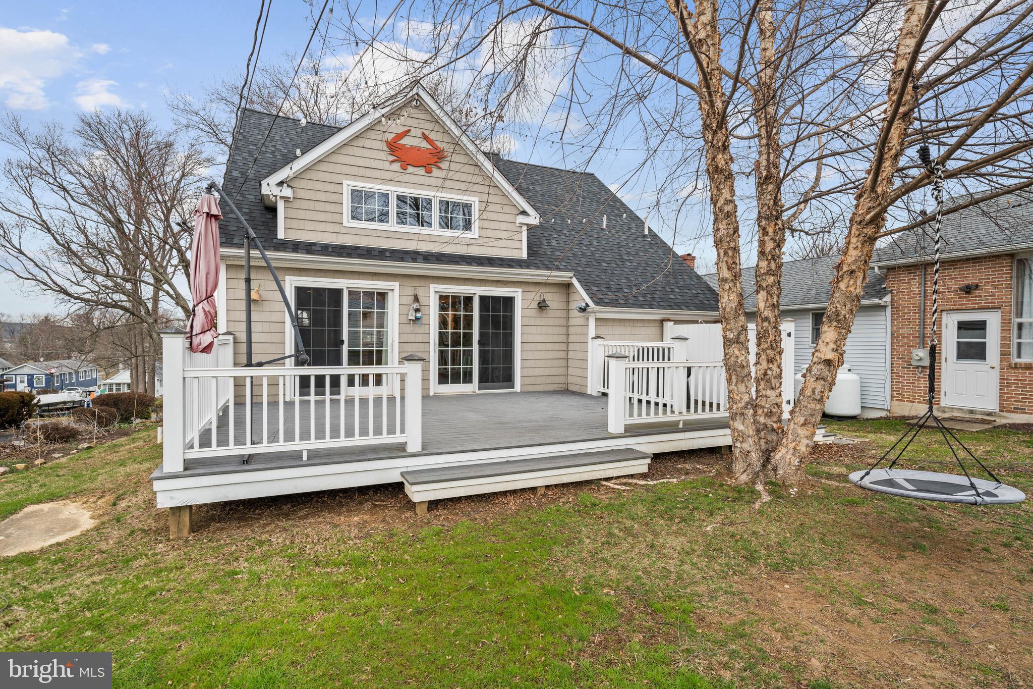 38 Virginia Avenue Earleville, MD 21919 - Photo 9 of 60 a view of a house with a small yard and large tree