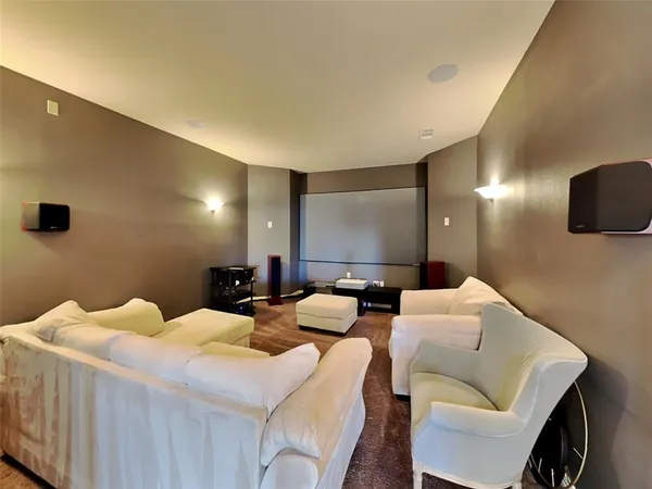 a bedroom with bed and a couch