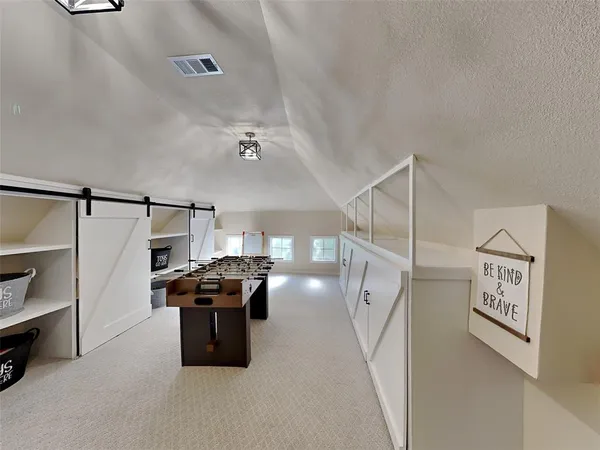 a view of a room with lots of appliances