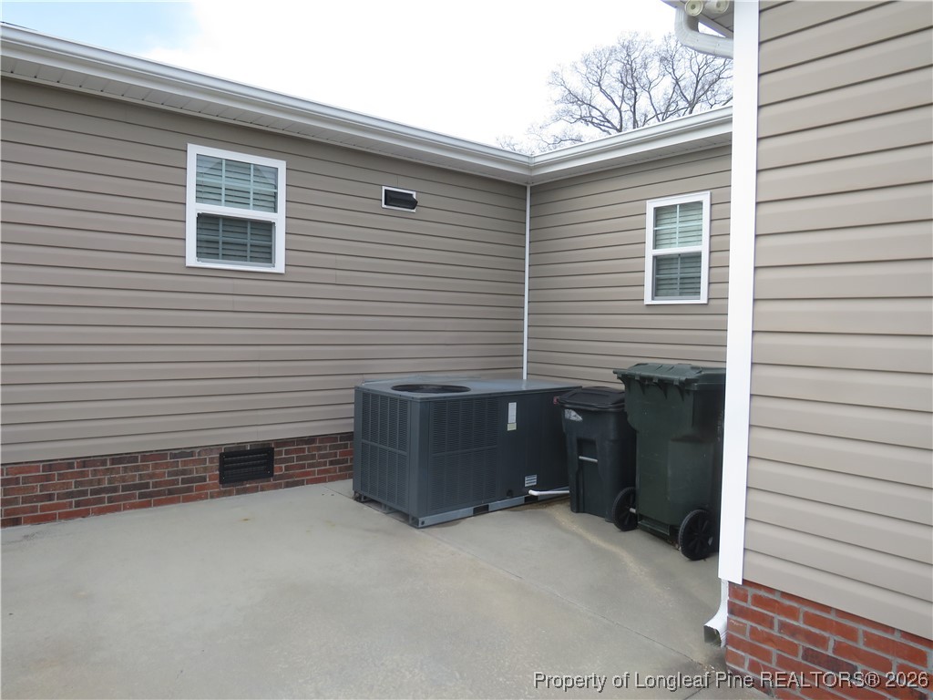 1184 Fisher Road St. Pauls, NC 28384 - Photo 6 of 29 a backyard of a house