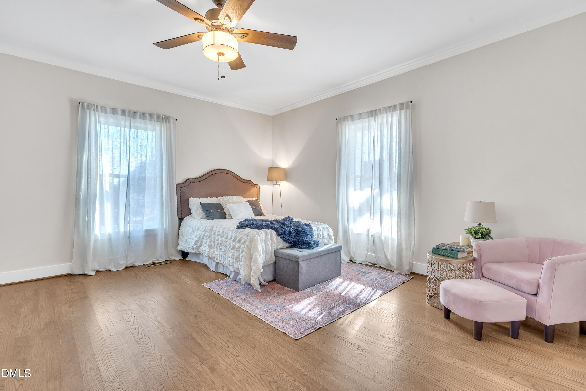 701 Eva Street Durham, NC 27701 - Photo 10 of 29 a bedroom with a bed and window
