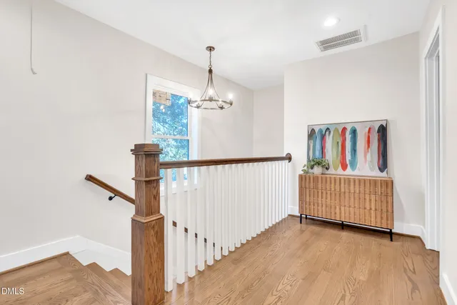 a view of staircase with white walls