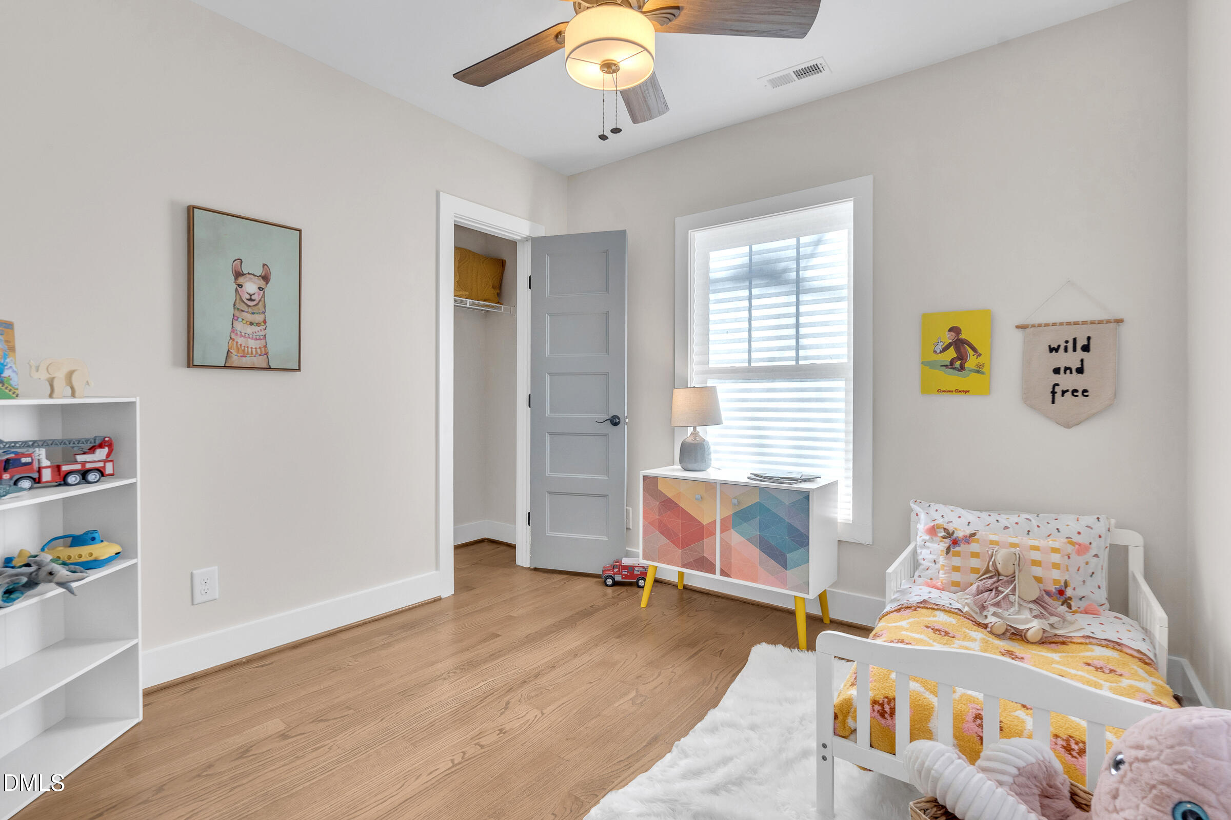 701 Eva Street Durham, NC 27701 - Photo 13 of 29 a bedroom with furniture and a window