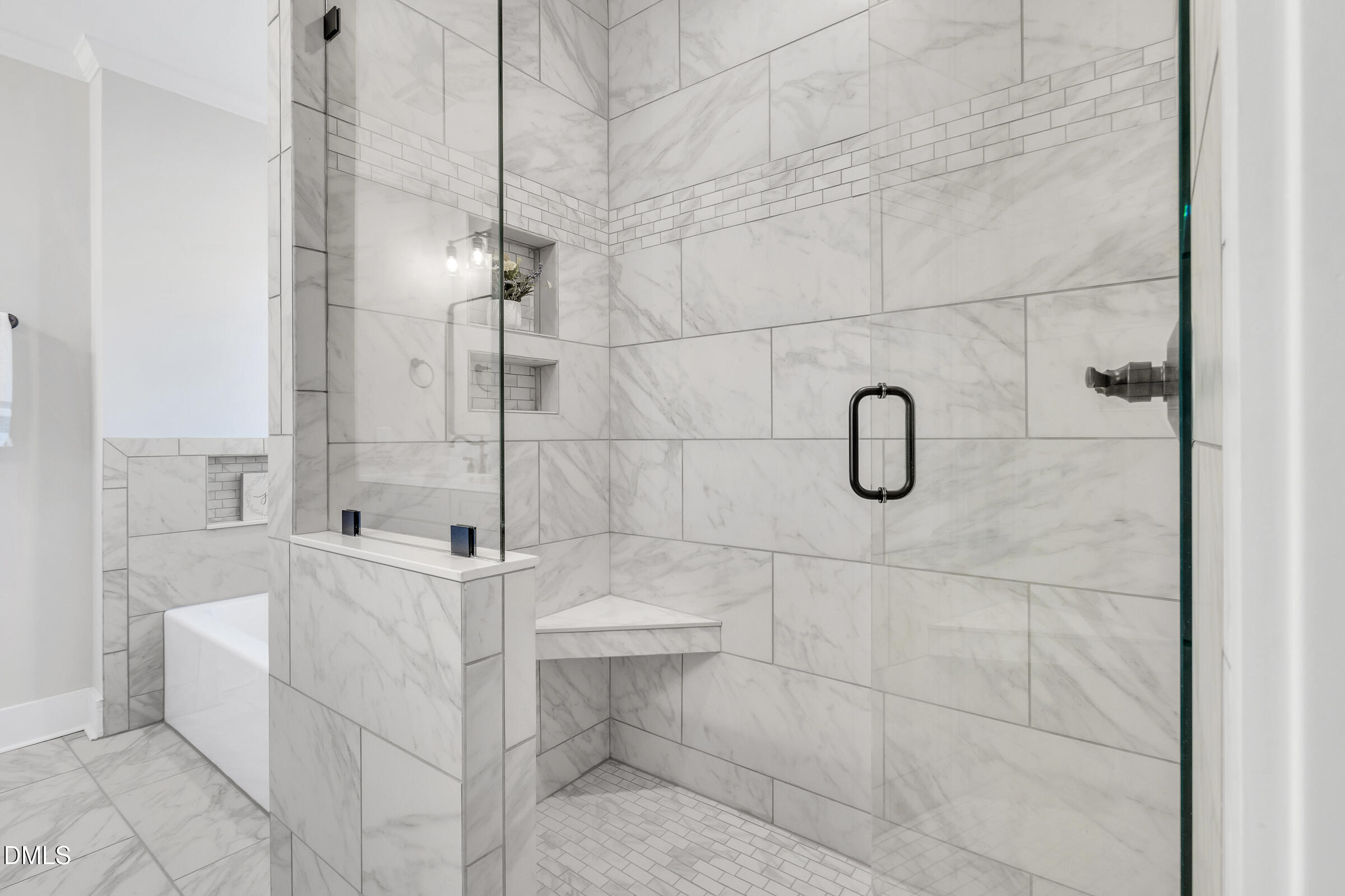 701 Eva Street Durham, NC 27701 - Photo 17 of 29 a bathroom with a bathtub and shower