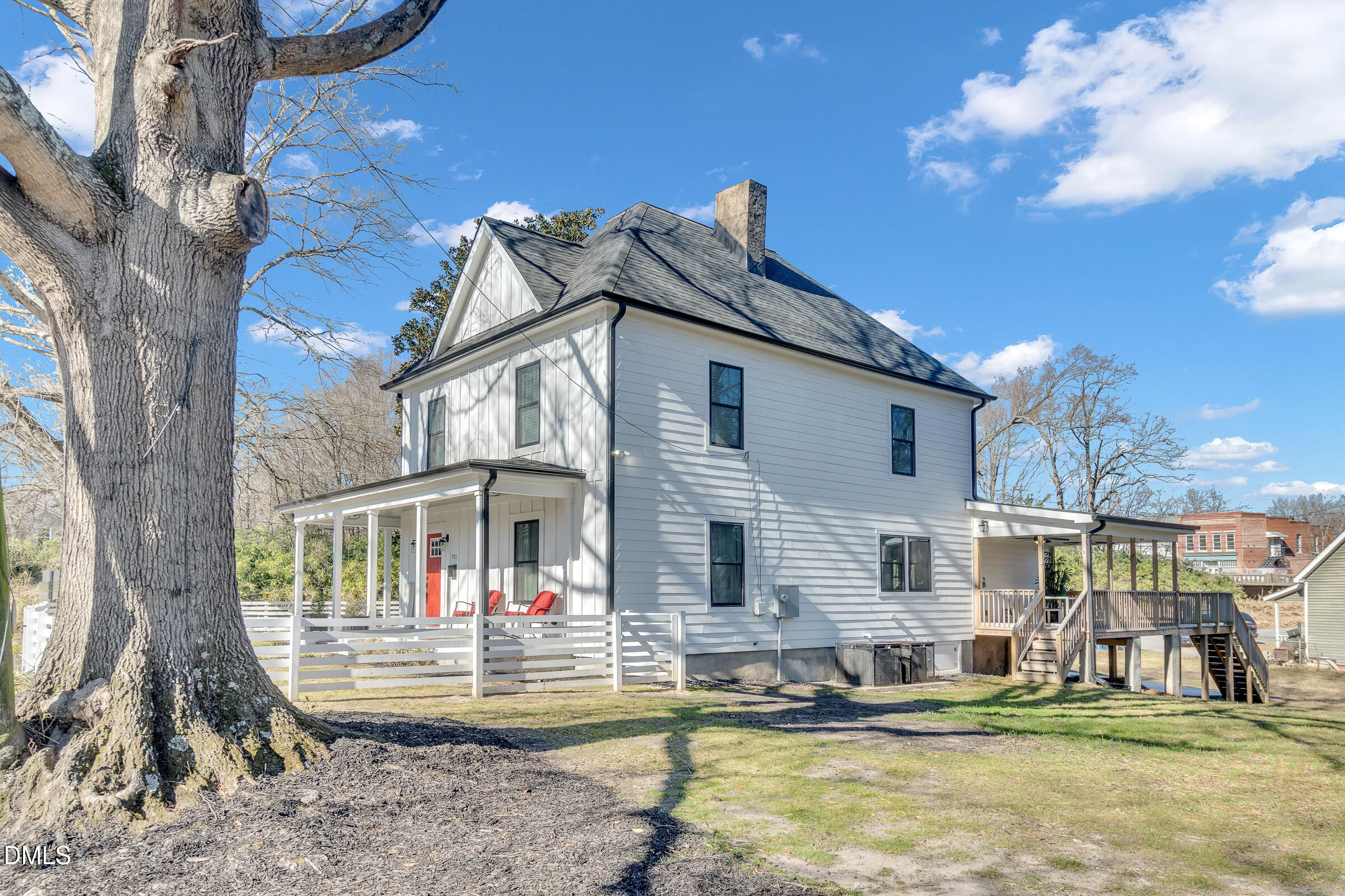 701 Eva Street Durham, NC 27701 - Photo 18 of 29 a view of a house with backyard and sitting area