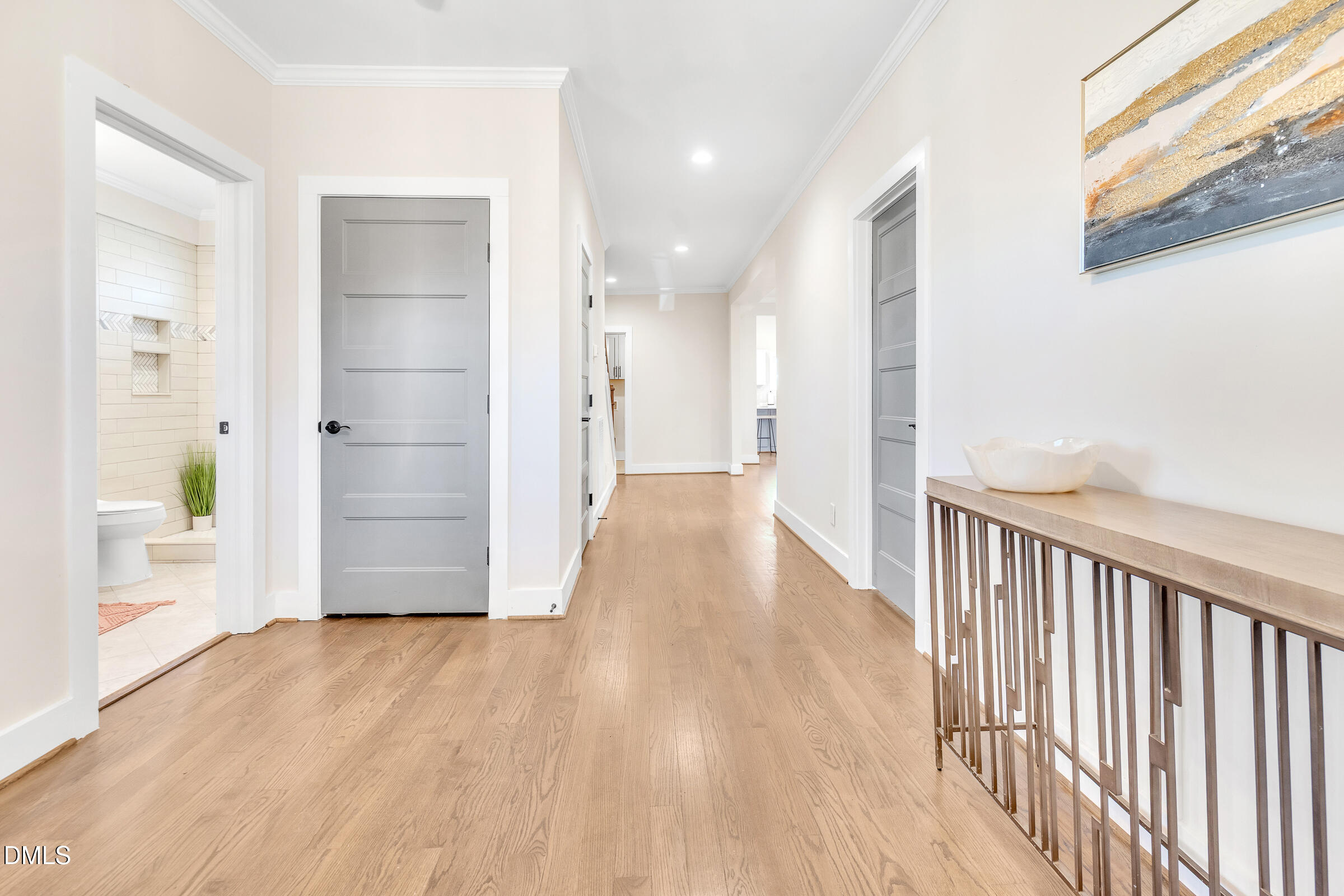 701 Eva Street Durham, NC 27701 - Photo 4 of 29 a view of a hallway with wooden floor