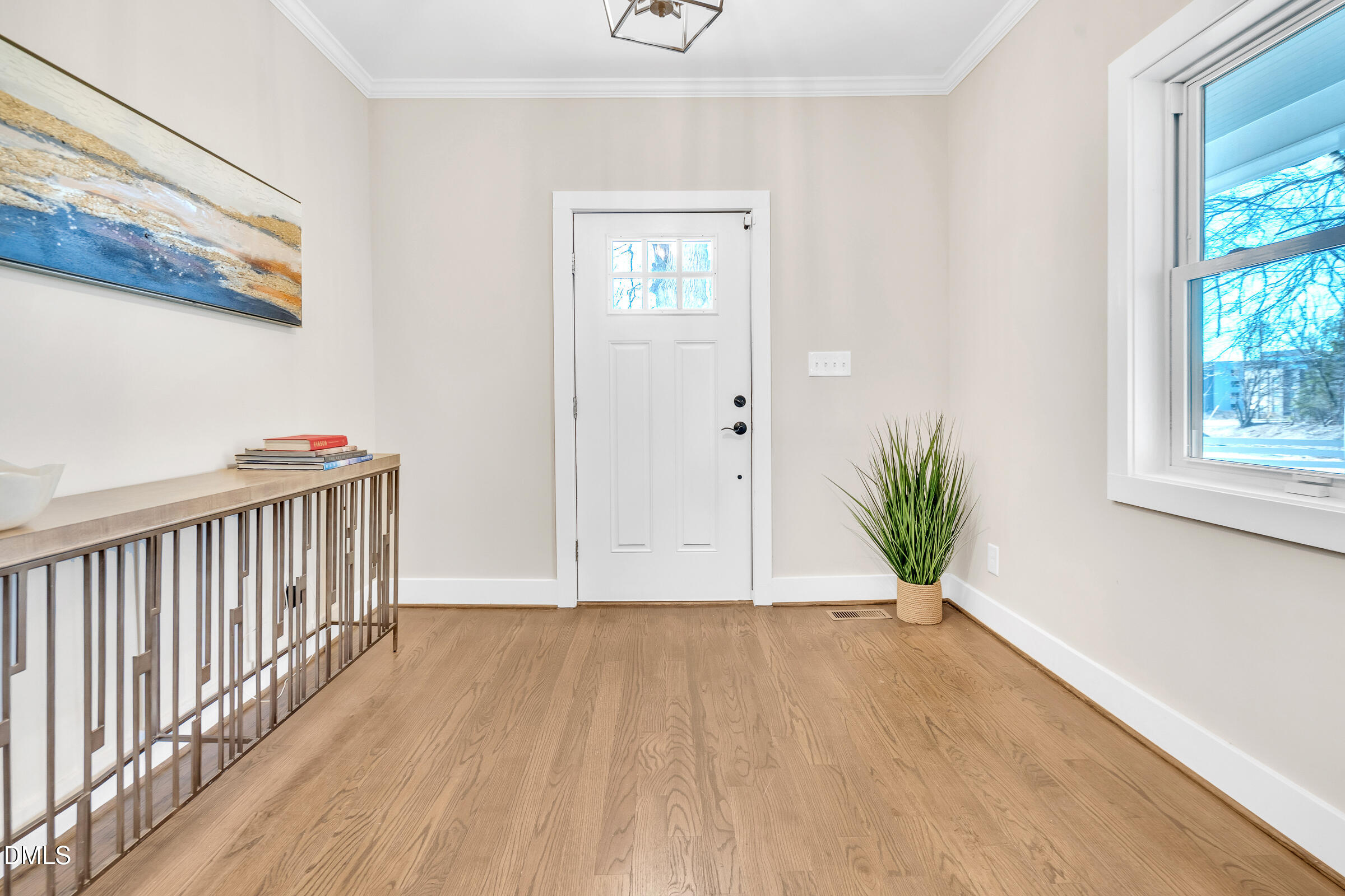 701 Eva Street Durham, NC 27701 - Photo 7 of 29 a view of an entryway with wooden floor