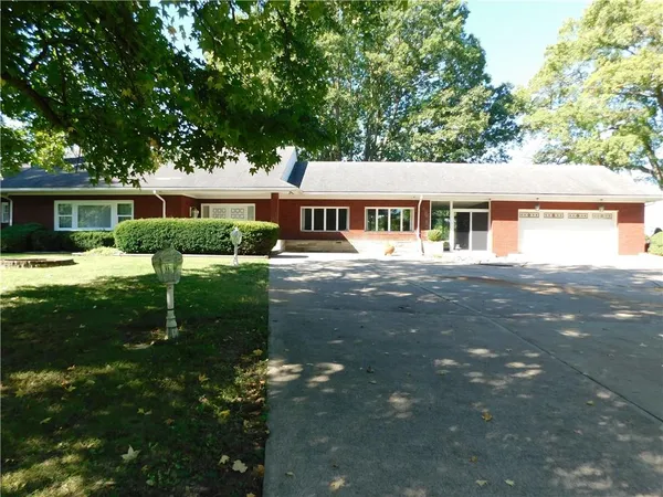 a house view with a garden space
