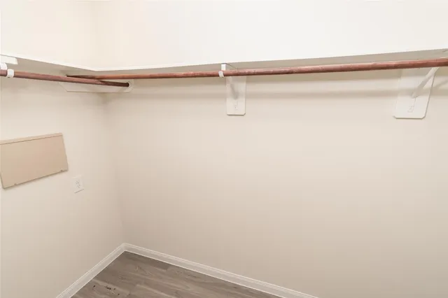 a view of a room with racks on the wall