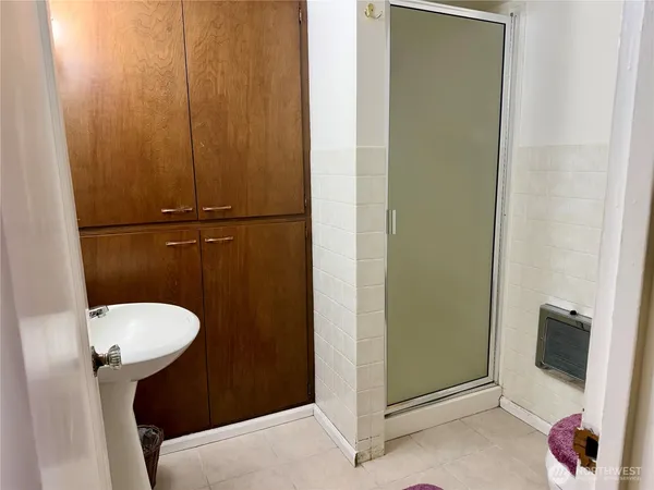 a bathroom with a toilet and a sink