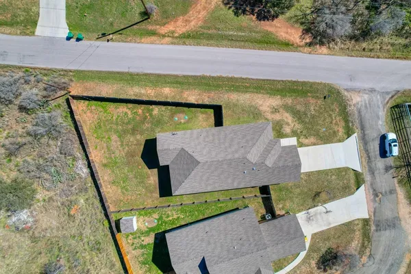 swimming pool view with sitting space and garden