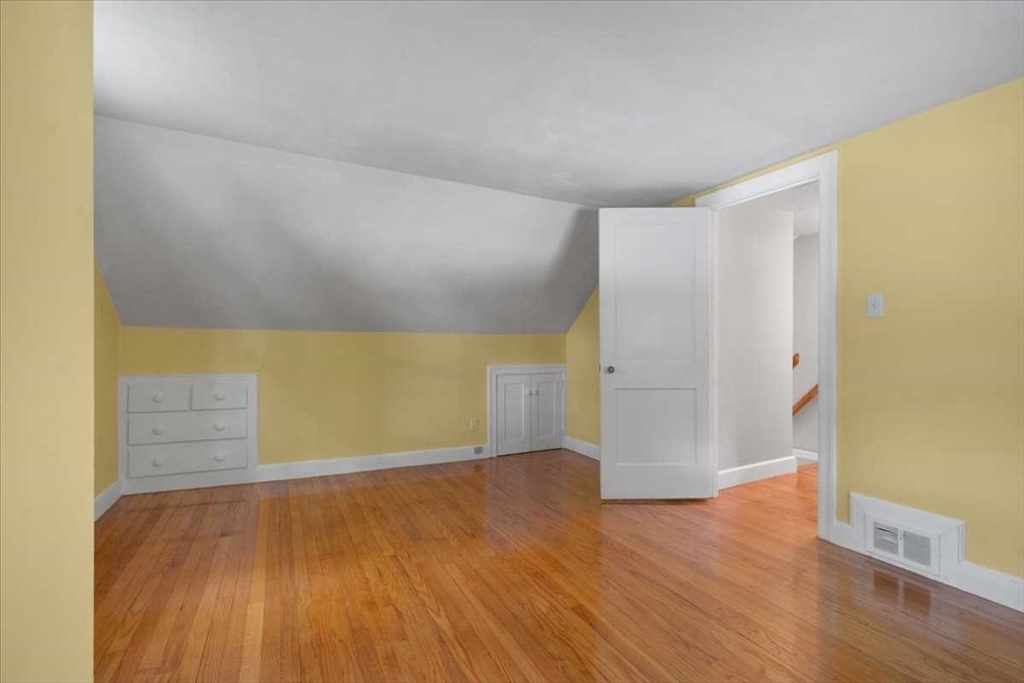 23 Marshall Road Natick, MA 01760 - Photo 20 of 31 a view of empty room with wooden floor