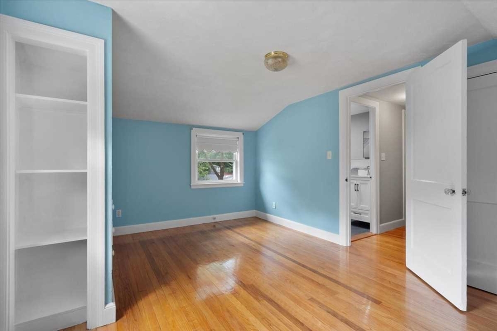 23 Marshall Road Natick, MA 01760 - Photo 22 of 31 a view of empty room with wooden floor