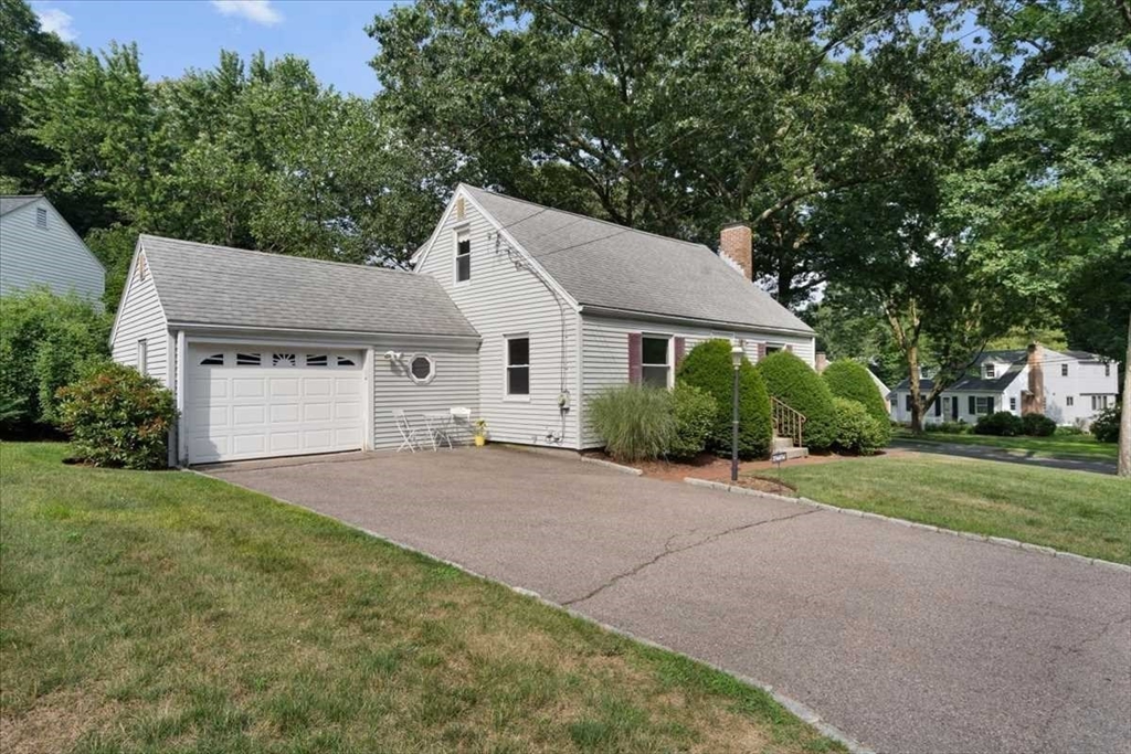 23 Marshall Road Natick, MA 01760 - Photo 24 of 31 a front view of a house with a yard and trees