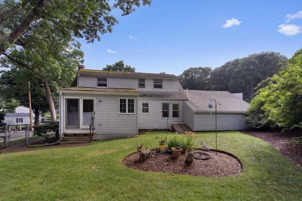 23 Marshall Road Natick, MA 01760 - Photo 27 of 31 a house view with a garden space