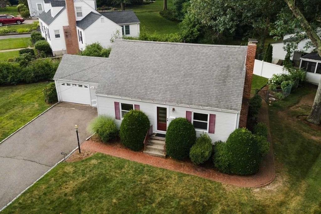 23 Marshall Road Natick, MA 01760 - Photo 28 of 31 a aerial view of a house with a yard and plants