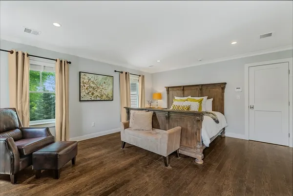 a bed room with furniture and a window