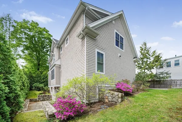 a front view of a house with yard