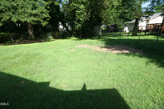 a view of a windows and chandelier in a room