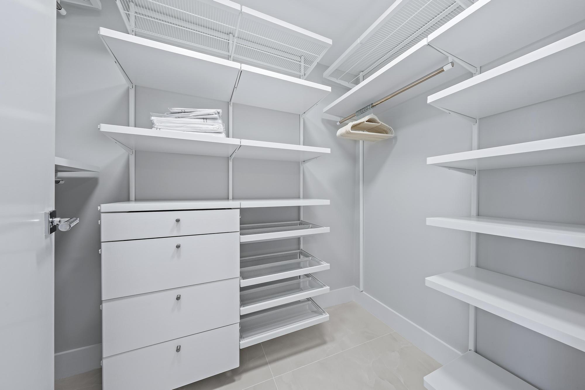 3456 South Ocean Boulevard, Unit 701 Palm Beach, FL 33480 - Photo 13 of 20 a view of an empty walk in closet