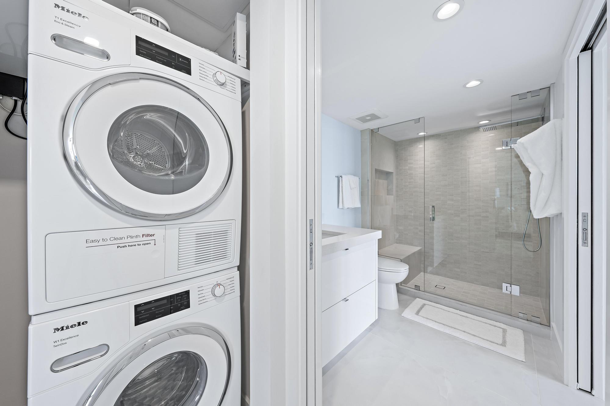 3456 South Ocean Boulevard, Unit 701 Palm Beach, FL 33480 - Photo 15 of 20 a bathroom with a sink a toilet and shower