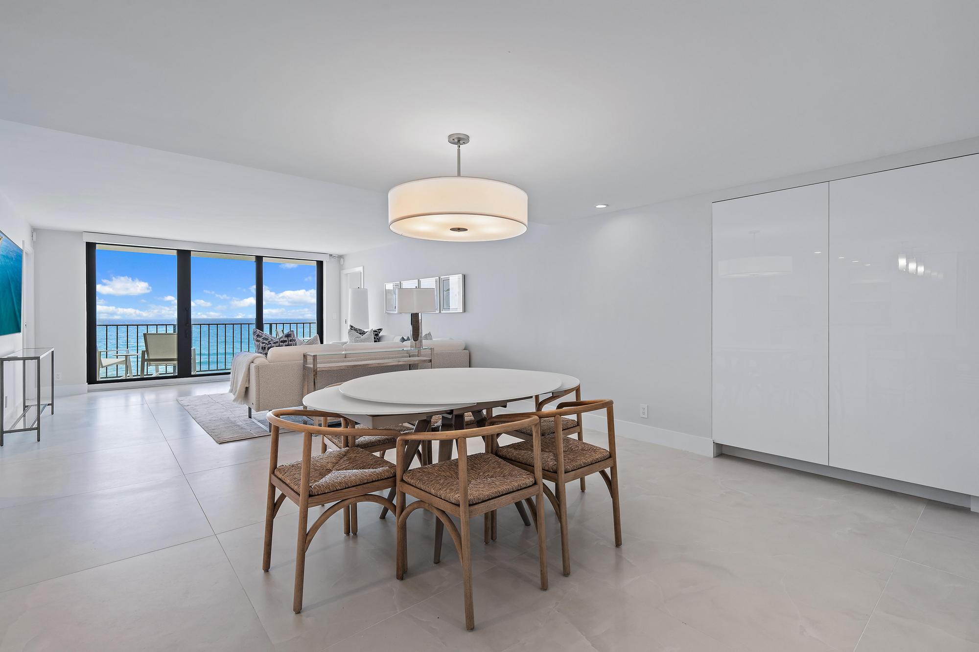 3456 South Ocean Boulevard, Unit 701 Palm Beach, FL 33480 - Photo 7 of 20 a dining room with furniture and window