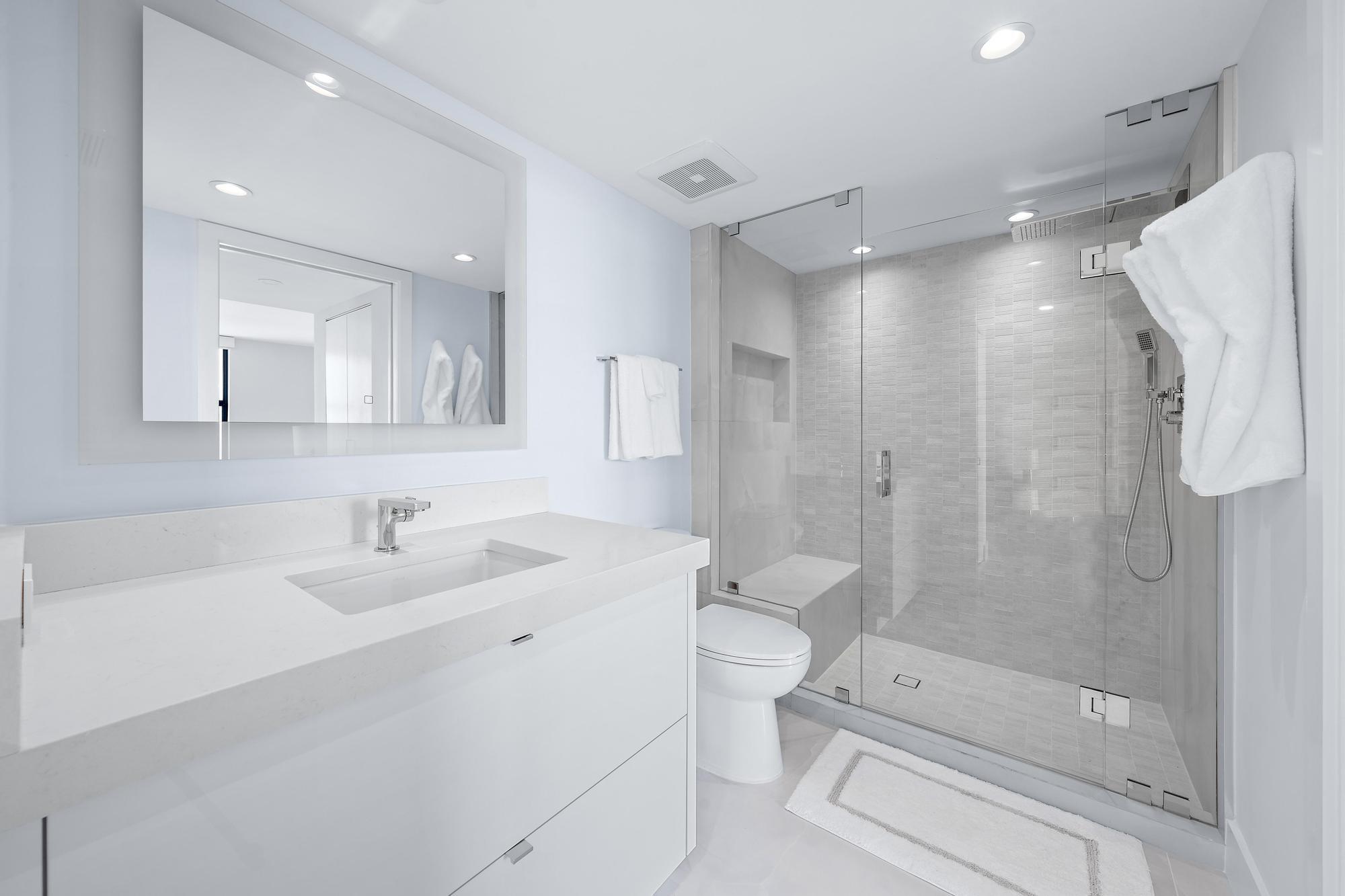 3456 South Ocean Boulevard, Unit 701 Palm Beach, FL 33480 - Photo 9 of 20 a bathroom with a sink toilet and shower