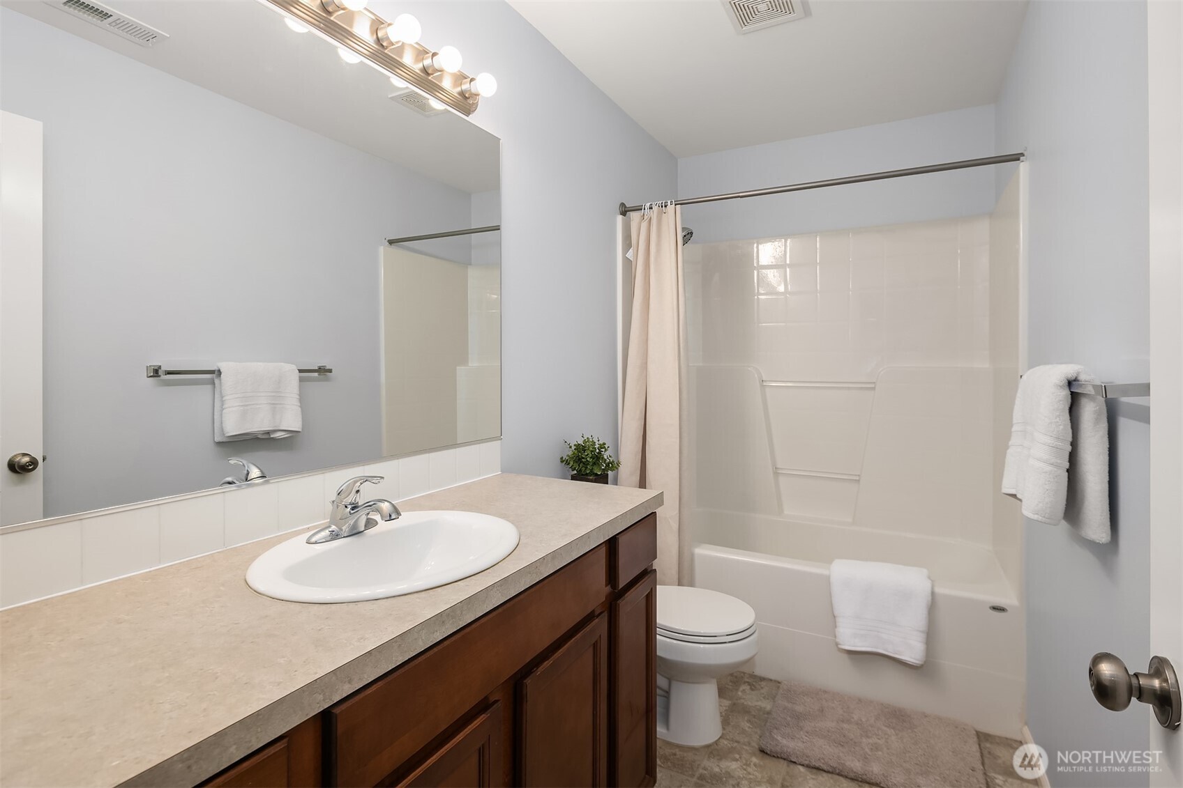 4119 167th Place Southeast Bothell, WA 98012 - Photo 23 of 39 a bathroom with a sink toilet and shower