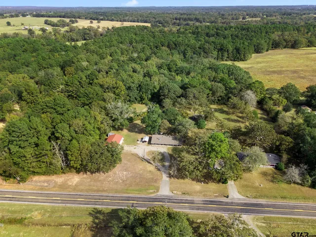 a view of a yard with an outdoor space