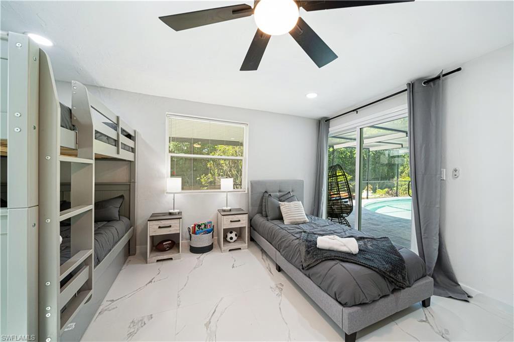 4439 Parrot Avenue Naples, FL 34104 - Photo 25 of 39 a living room with furniture