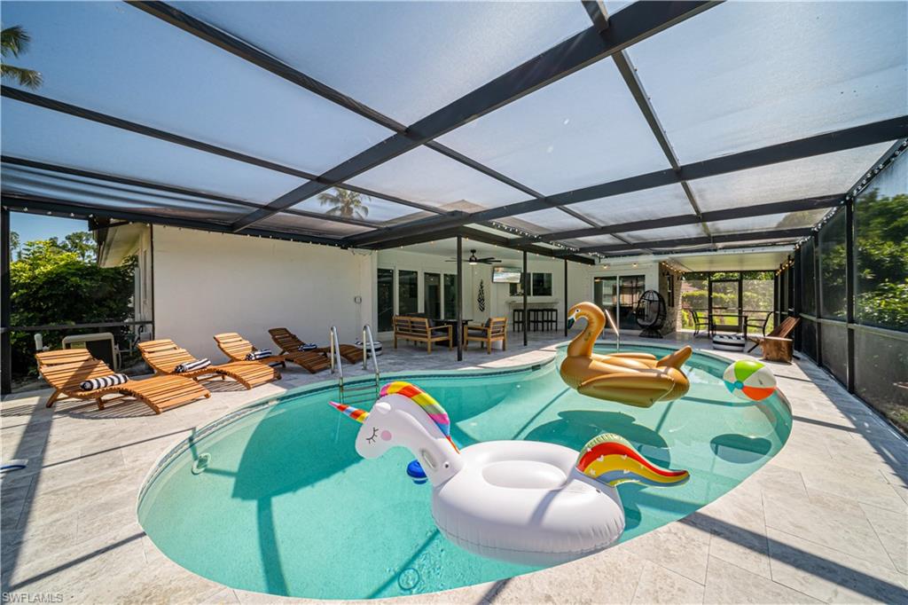 4439 Parrot Avenue Naples, FL 34104 - Photo 30 of 39 a outdoor space with furniture