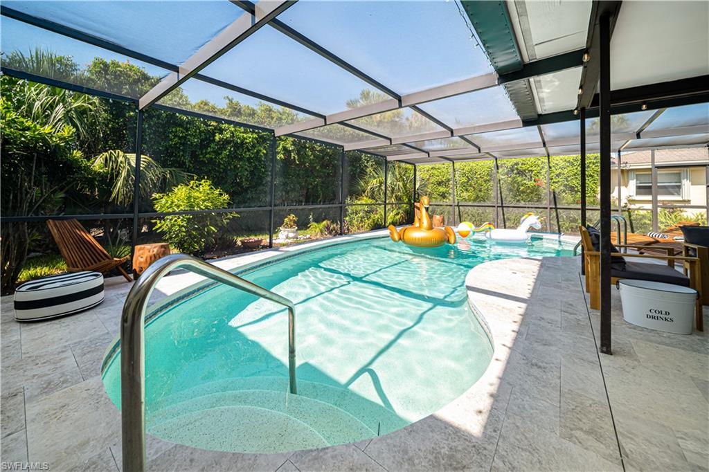 4439 Parrot Avenue Naples, FL 34104 - Photo 33 of 39 a view of swimming pool with a patio