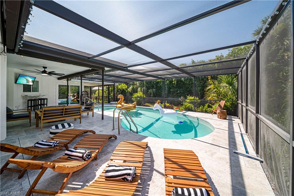 4439 Parrot Avenue Naples, FL 34104 - Photo 34 of 39 a view of outdoor seating area