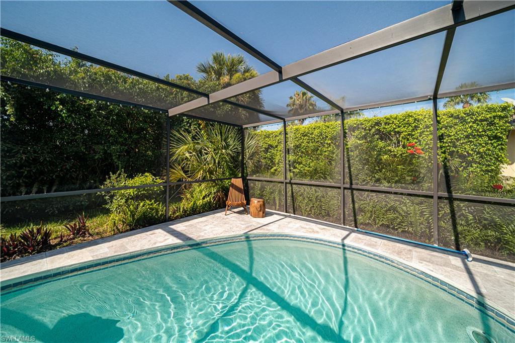 4439 Parrot Avenue Naples, FL 34104 - Photo 35 of 39 a house view with a swimming pool