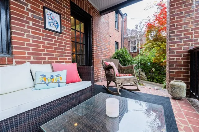 a view of a house with a yard and plant