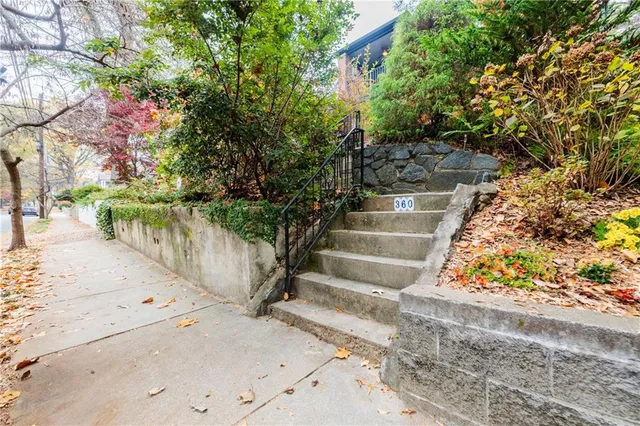 a view of a house with a street