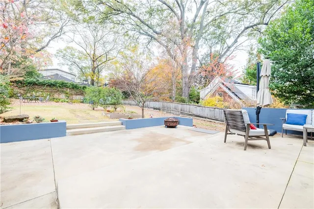 a bathroom with a toilet a sink and a mirror