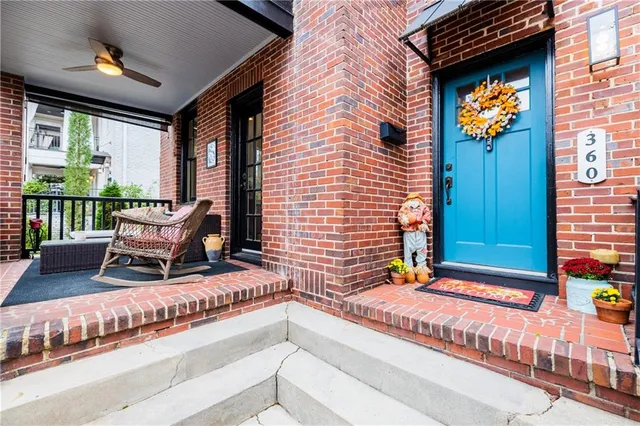 a view of a yard with snow on the road