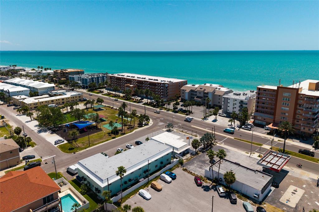 10 164th Avenue, Unit 1 Redington Beach, FL 33708 - Photo 34 of 38 an aerial view of a city with ocean view
