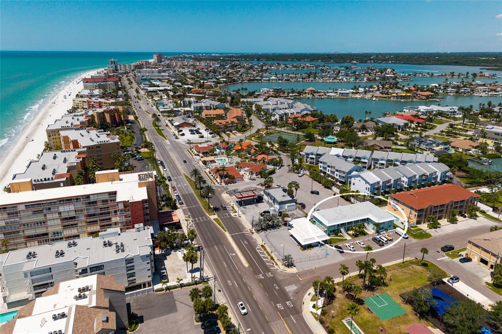 10 164th Avenue, Unit 1 Redington Beach, FL 33708 - Photo 36 of 38 an aerial view of a building with an outdoor space